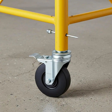 Tough As Nails 5 Inch Caster Wheels 4 Pack With Dual Locking Brakes For Heavy Liftin Jobs on yellow scaffold leg.