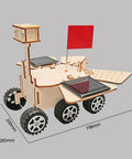 Solar Powered Mars Rover Kit Made Of Wood for DIY engineers, showing dimensions and solar panels on wheels.