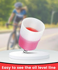 Pro Grade Hydraulic Disc Brake Bleed Kit For Shimano TEKTRO TRP funnel showing mineral oil level with cyclist in background