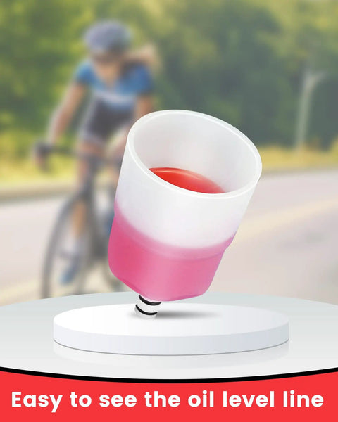Pro Grade Hydraulic Disc Brake Bleed Kit For Shimano TEKTRO TRP funnel showing mineral oil level with cyclist in background