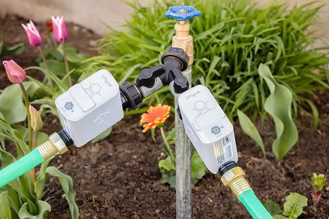 B-hyve Smart Hose Watering Timer 2-Pack With Wi-Fi Hub And Hose Splitter Gray attached to garden faucet