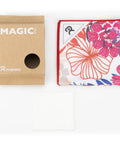 Self Adhering Lens Wrap For Cameras And Phones Protective Gear Shield Washable Cleaning And Storage Cloth For DSLR Lenses And Accessories Seventeen Point Seven By Seventeen Point Seven Inches Floral Pattern, folded cloth next to packaging
