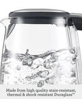 Close-up of Crystal Clear Glass Electric Kettle With German Schott Glass Soft Opening Lid boiling water