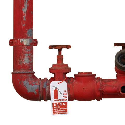 50 Pack Fire Extinguisher Tags With Adjustable Wire Ties 4 Point 2 By 2 Point 1 Inches Waterproof attached to red pipe