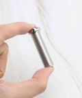 Close-up of a Two Pack Stainless Steel Sink Strainer Screw 304 Thickened Threaded Connector M12, 45mm Long, shown held in hand