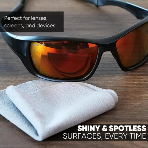 Gray microfiber lens cleaning cloths, 8x8 in, two shown on wooden surface; for lenses and screens on devices