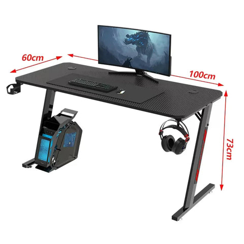 Dope Rose Pink Gaming Desk With Rgb Ambient Glow Spacious Pc Worktable For Home Office And Bedroom Setup Height Adjustable Standing Table For Teens And Students with monitor and accessories.