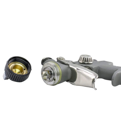Handy Mini Hvlp Gravity Feed Spray Paint Gun With Zero Point Eight Mm Needle Tip and Sixteen Ounce Mixing Cup close-up showing nozzle and chamber.
