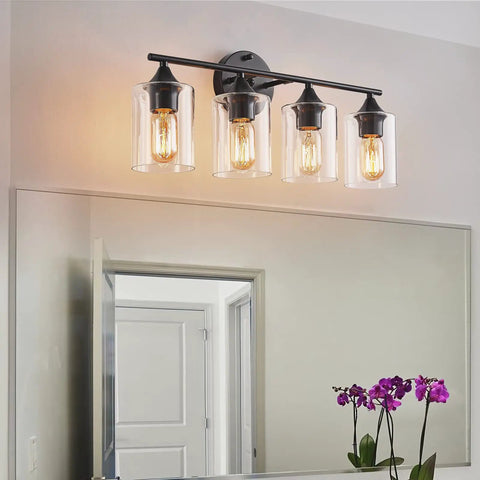 Four Light Matte Black Bath Vanity Light With Clear Glass Shades Industrial Farmhouse Sleek Modern Wall Sconce over mirror