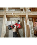 M12 Fuel Cordless Hammer Drill Kit Delivering Knockout Torque And Slick Grip Handling used to drill into concrete framing.
