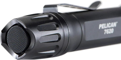 Close-up of black Beast Mode Tactical LED Flashlight with 1124 Lumens, clip and textured tail cap visible, aluminum body detail.