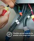 Performance Plus Red Yellow Wire Connector Jug Of 500 in use on black cables, demonstrating easy install splice capabilities
