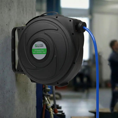 Elite Retractable Air Hose Reel With Three Eighth Inch By Fifty Foot PU Hose mounted on workshop wall
