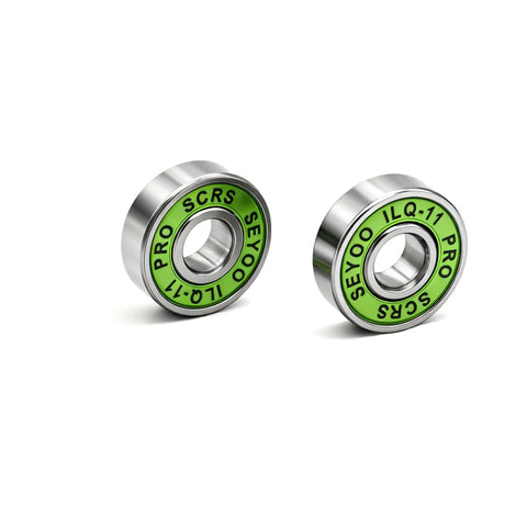Two 8Pcs 608-2RS Skateboard Bearings With Green Covers Ultimate ILQ-11 Standard, showing sealed steel design for skating.