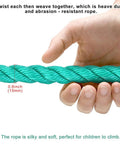 Close-up of hand holding 15mm thick rope for Outdoor Climbing Cargo Net For Kids With No Knot Nylon Rope 139 Inch Long By 30 Inch Wide Usable Length 108 Inches Rugged Rust Proof Hardware Easy Mount Playground Ladder Net For Treehouse Swing Set Backyard Playset Kid Friendly