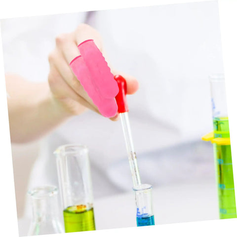Person using pink Nitrile Latex Finger Cots while handling a dropper over test tubes, promoting safe worksite use.