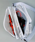 Killer Protective Clear Crossbody Tool Bag For Cleanroom Engineers Featuring Sick Storage And Secure Computer Carrying With Smooth Adjustable Straps That Are Zero Hassle, revealing tools inside.