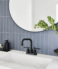 Matte Black 4 Inch Centerset Bathroom Faucet With Two Handles High Arc Lavatory Sink Tap Lift Rod Drain Stopper And 360 Degree Rotation For Modern Vanity against blue tile wall