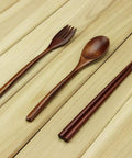 Six Piece Japanese Natural Wooden Spoons Set For Cooking And Eating Great For Stirring Tea Honey Soda Dessert And Nonstick Pots Made From Nanmu Wood About Eight Point Seven Eight Inches Long Eco Friendly Kitchen Tools on wooden table.