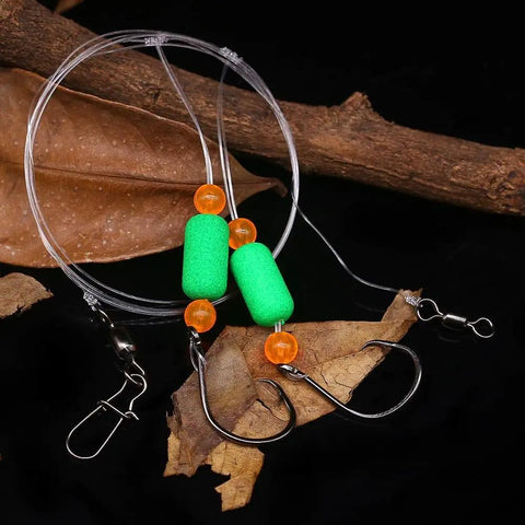 Surf Fishing Rigs For Pompano And Saltwater Gear with circle hooks and green floats on dark background