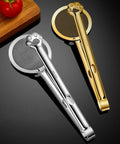 Two stainless steel oil strainer spoons with claw design and round mesh filters; silver and gold finishes.