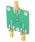 Built To Last Two Way RF Power Splitter PCB Board DC To Five Gigahertz Frequency Range With Six Decibel Attenuation, green PCB.