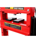 Professional Grade 30 Ton Air Hydraulic Shop Press With Precision Gauge And Adjustable H Frame Design For Garage Floor Ready Builds And No Sweat Bearing Bushing Ball Joint Removal Jobs close-up of red structure with pressing plates