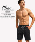 Model wearing Men's Quick Dry Swim Trunks With Zip Pockets And Drawstring Closure Built In Compression Liner For Modesty in Black
