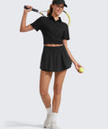 Woman wearing black Ruffle Skirt Overlay Workout Shorts For Women With High Rise Waist Built In Mesh Liner Quick Dry Soft Fabric, holding tennis equipment.