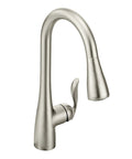Top Shelf One Handle Pull Down Kitchen Faucet Featuring Power Boost Technology And Reflex Docking System In Spot Resist Stainless Finish view from side.