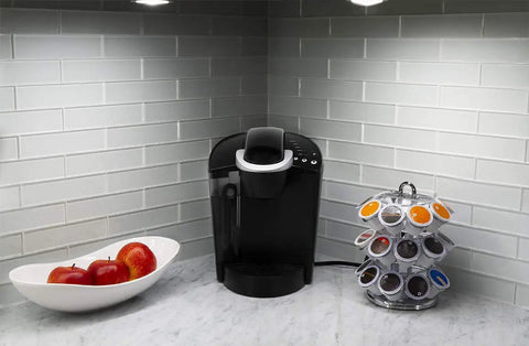 Kitchen counter with coffee maker, apple bowl, and LED Puck Lights 2 Pack Battery Operated Tap Light Wireless Stick On Under Cabinet Closet Pantry Lighting 50 Lumens No Wiring Needed Easy Install Perfect For Cabinets Closets And Pantries In Every Room illuminating tile wall.