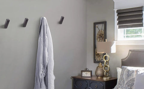 Bedroom scene with Dope Matte Black Towel Hooks Set 4 Heavy Duty Wall Mounted Stainless Steel 304 Robe Hooks Waterproof installed on wall.