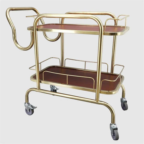 Knockout Two Tier Serving Cart Built Tough With Smooth Ride Casters Stainless Steel Kitchen Bar Trolley with gold frame and wooden shelves.