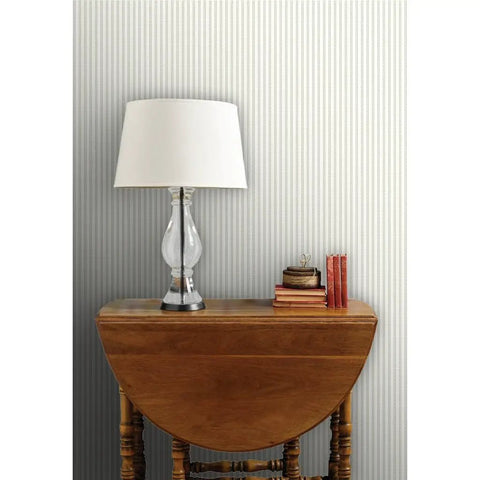 Premium Traditional Classic Pvc Free Professional Wallpaper Offering Subtle Linen Matte Texture on wall behind lamp and table.