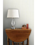 Top Shelf Heavy Duty Vinyl Wallpaper Featuring A Subtle Leather Texture Custom Printed For Commercial Spaces Offices Hotels, with lamp and table.