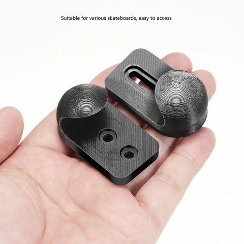 Hand holding Vertical Skateboard Holder For Wall Display And Storage, 1 Pair Wall Mount Hangers, black deck bracket