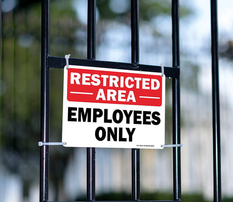Dang Solid Metal Restricted Area Sign And Employees Only Plate Two Piece Set 10 By 7 Inch attached to a fence barrier.