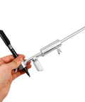 Hand holding Easy To Use Arch Line Marker from DIY Auto Body Dent Repair Kit With Wheel Arch Marker And Iron Tool For Sheet Metal Restoration.