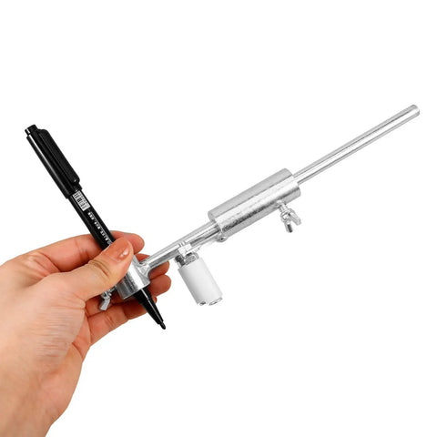 Hand holding Easy To Use Arch Line Marker from DIY Auto Body Dent Repair Kit With Wheel Arch Marker And Iron Tool For Sheet Metal Restoration.
