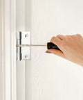 Installing Twenty Pack Heavy Duty Stainless Steel Folding Butt Hinges 2 Inch with screwdriver on wood.