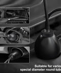 Installed automotive bladder leak tester on car intake; black expandable bladder with hose