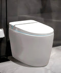 Next Level Tankless Smart Toilet With Auto Open Lid And Foot Kick Sensor Features Five Zone Heated Seat Plus Quick Dry Air Blower Dual Flush Options Ambient Night Glow Remote Control For No Fuss Bathroom Setups side view against a dark wall.