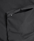 Close-up of waterproof 210D patio cooler cart cover pocket detail, fits 33W x 19D x 31H for 80 Qt rolling coolers with wheels.