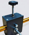 Close-up of pro-grade aluminum wire puller for snappy cable feeding. Features black metal body and golden pull bar.