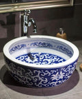 Top Shelf Vintage Round Ceramic Vessel Sink For Bathroom Vanity Above Counter Durable Porcelain Wash Basin With High Gloss Premium Glaze intricate blue and white design in bathroom setting