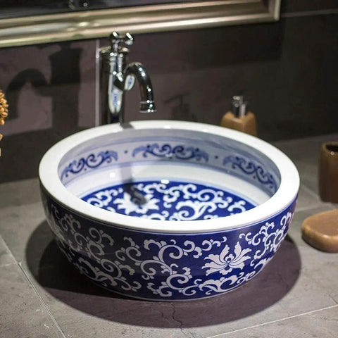 Top Shelf Vintage Round Ceramic Vessel Sink For Bathroom Vanity Above Counter Durable Porcelain Wash Basin With High Gloss Premium Glaze intricate blue and white design in bathroom setting