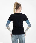Back view of person wearing Ice Silk Arm Sleeves for Outdoor Comfort with Moisture Wicking Breathable Fabric and Sailing Sunset Scene pattern