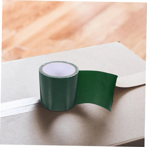 Green roll of Heavy Duty Canvas Repair Tape for Awnings Tents and Boat Covers with Strong Adhesion on a box