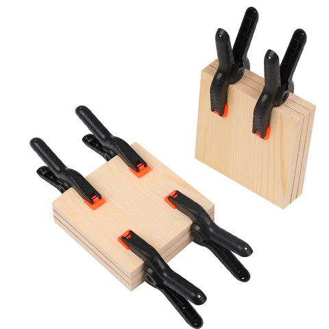 8 Pack 4.5 Inch Spring Nylon Clamps Heavy Duty Plastic Clips for crafts and woodworking, securing wooden boards.