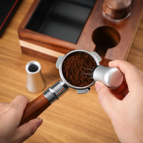 Hands using Espresso Distribution Tool With 10 Needle 0.35mm Precision Stirrer for Even Extraction on portafilter